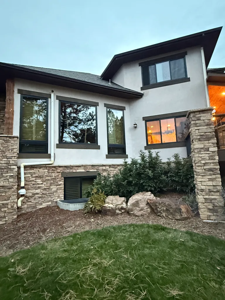 Beautiful home exterior with garden and flowers